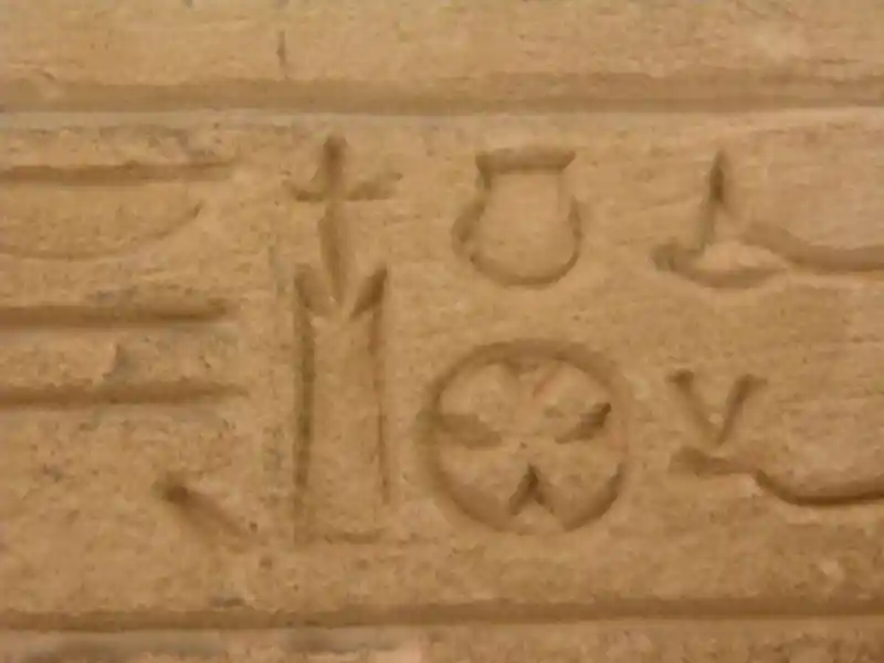 A cross without frame and a cross inside a circle symbols on a prechristian funerary stele